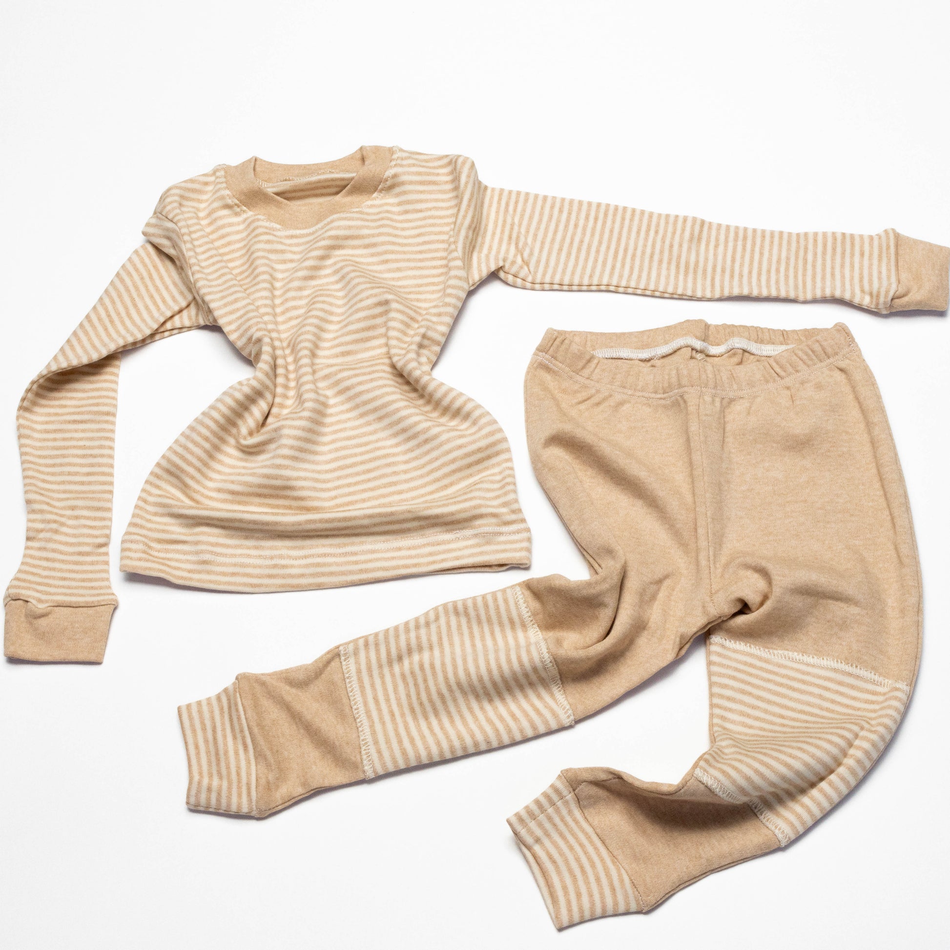 Organic Beige striped long-sleeve shirt and leg crawling pants on a white background