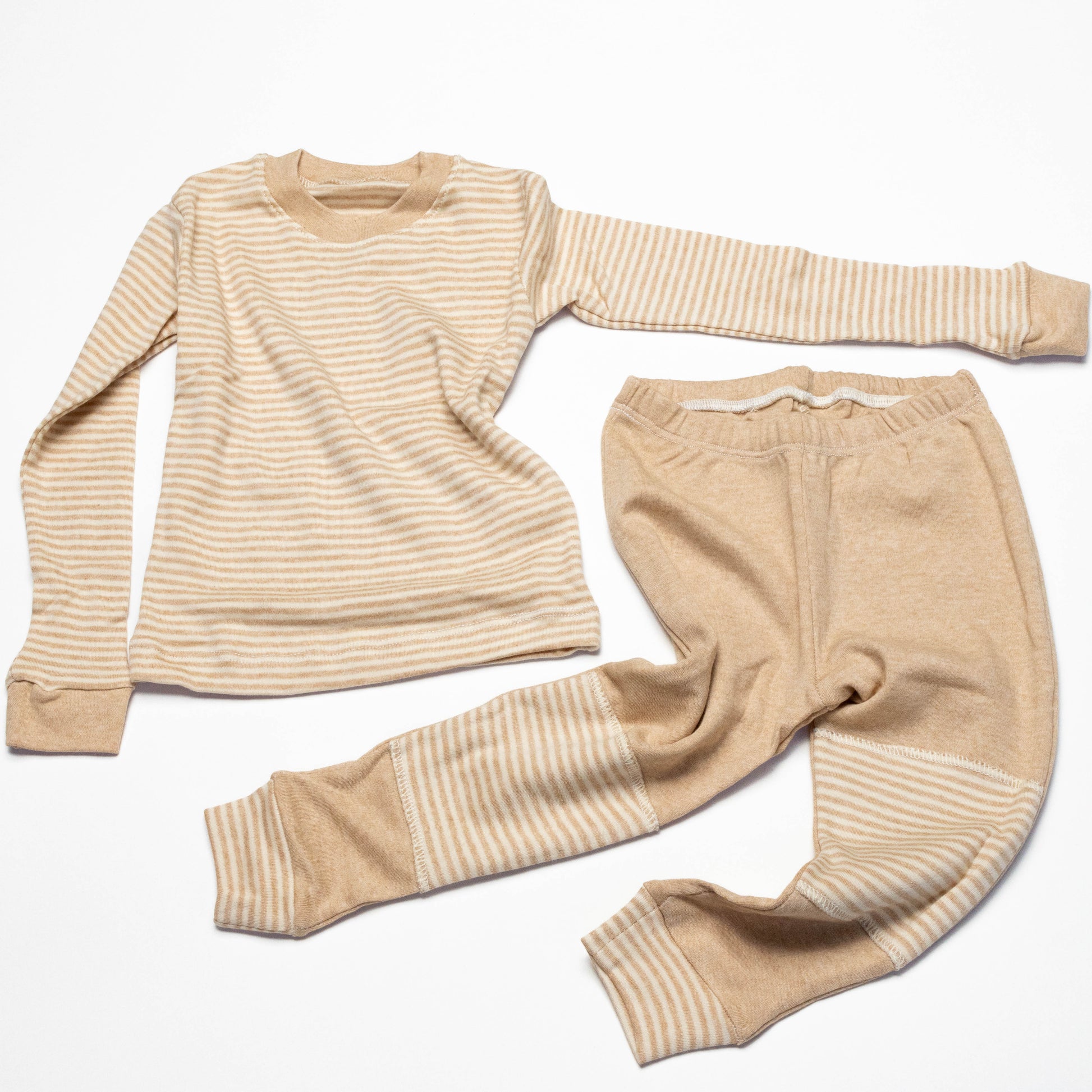 Organic Beige striped long-sleeve shirt and leg crawling pants on a white background