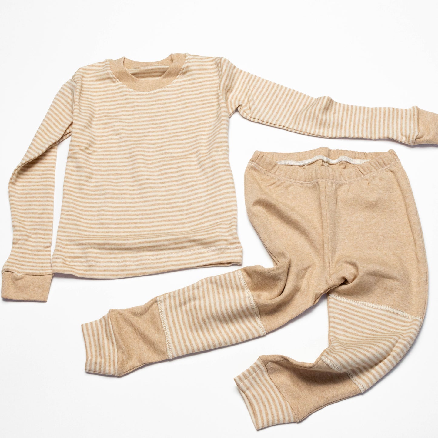Organic Beige striped long-sleeve shirt and leg crawling pants on a white background