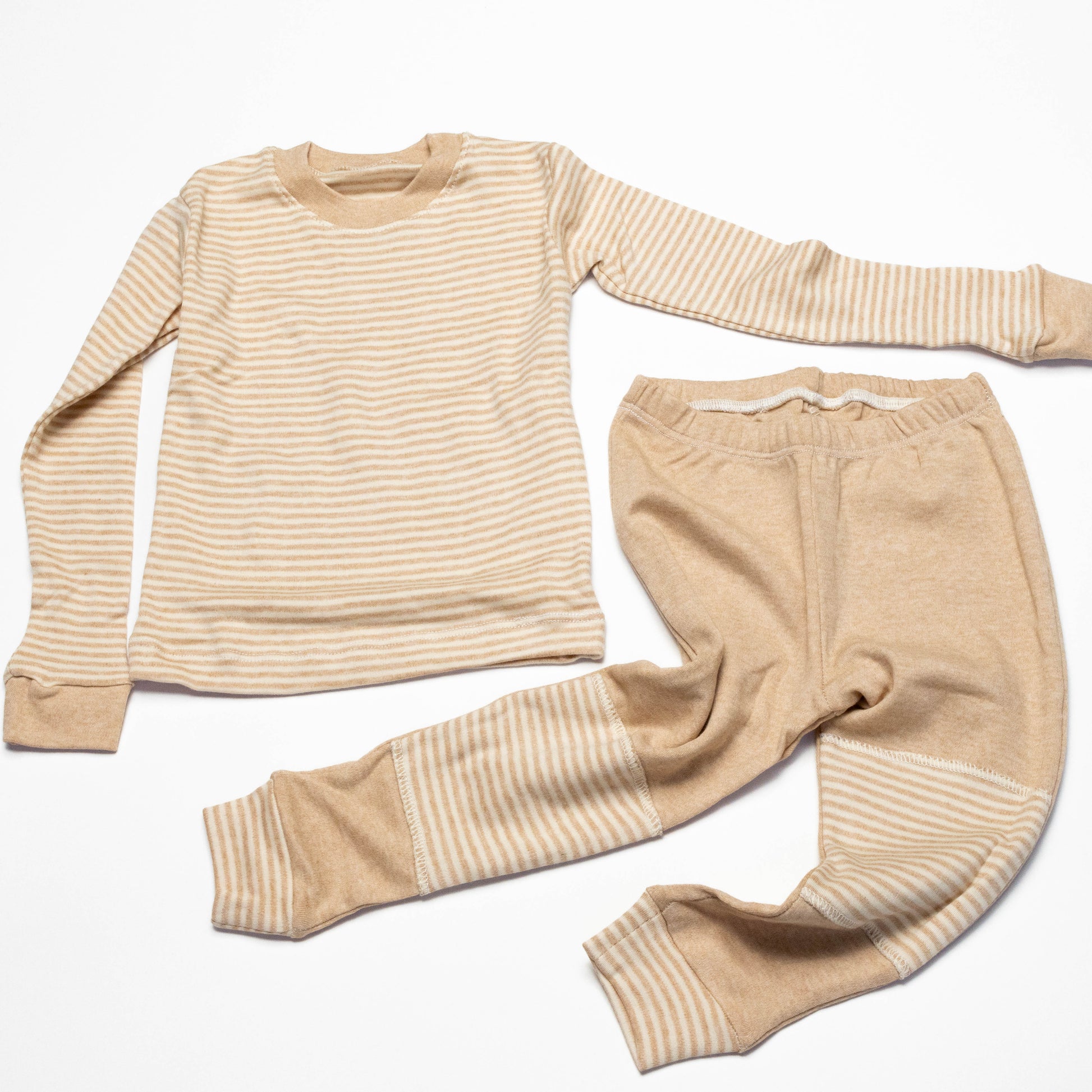 Organic Beige striped long-sleeve shirt and leg crawling pants on a white background