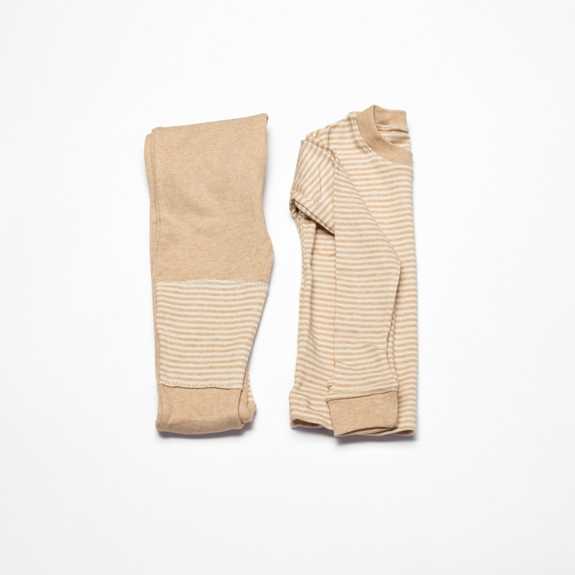 Organic Beige striped long-sleeve shirt and leg crawling pants on a white background