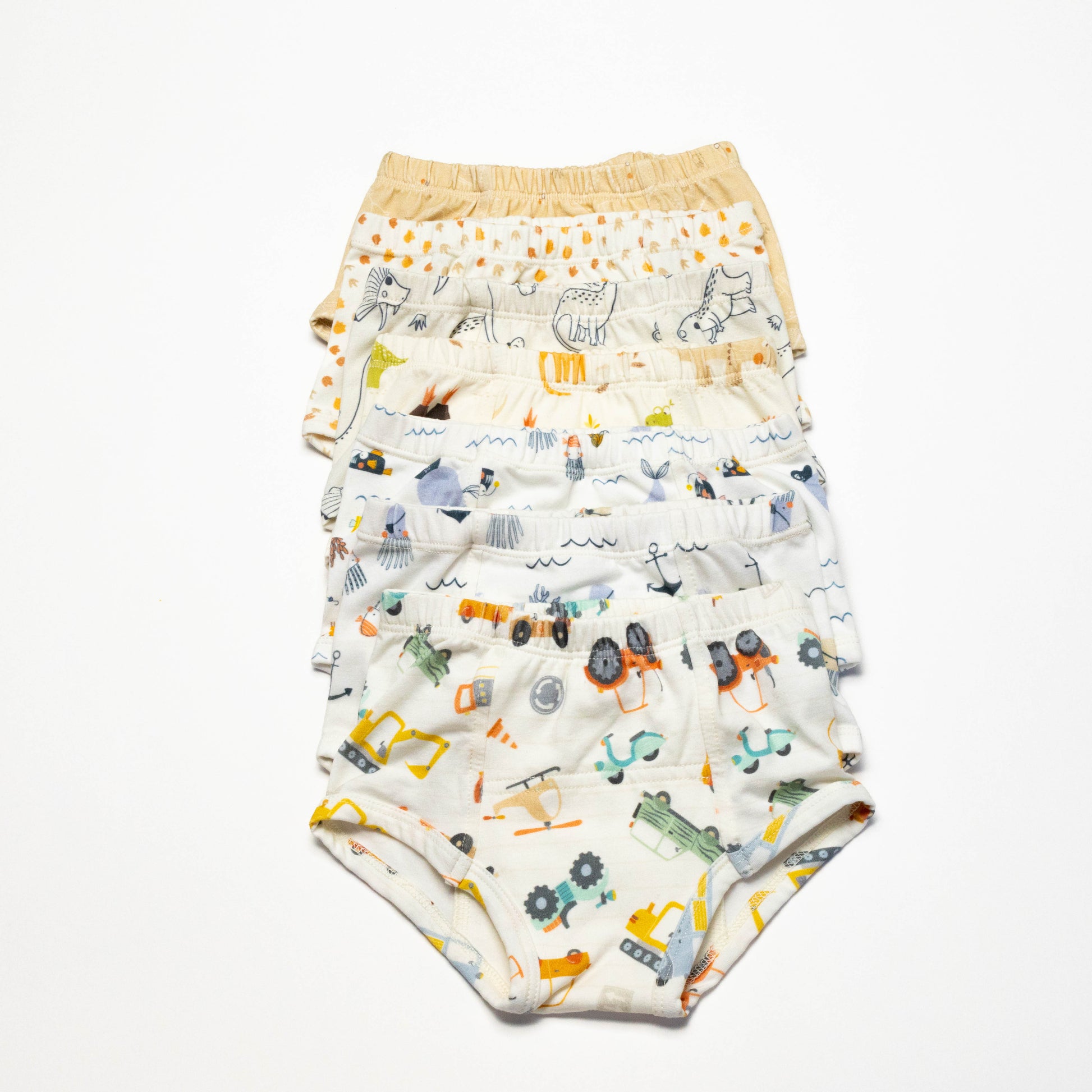 Bundle of 7 Organic Potty Training Underwear with animal prints on a white background