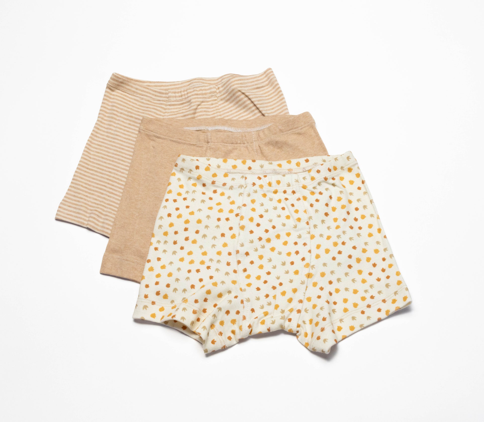 Three pairs of organic cotton boxer briefs in different patterns on a white background for sensitive skin size 8