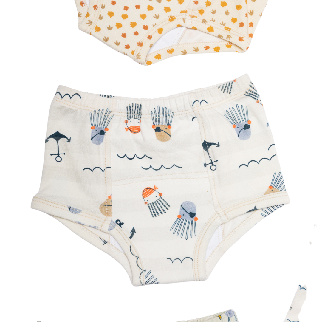 With their unique hand-illustrated designs comfortable construction using organic cotton, non toxic sustainable materials, our potty-training underpants seamlessly blend style with functionality while prioritizing the well-being of both our planet and your little ones. delightful ocean motif, showcasing pirates octopus over the organic cotton, non-toxic training underwear
