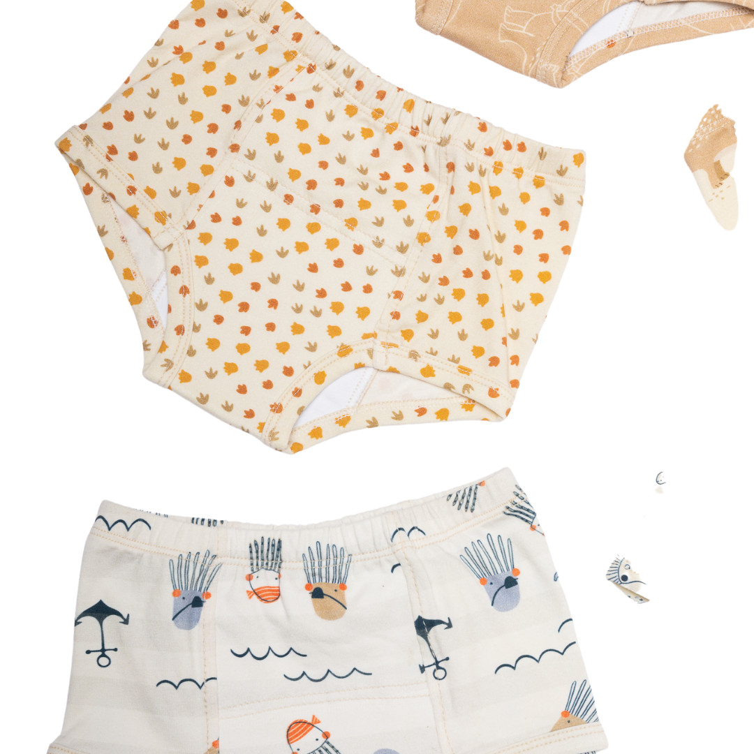 With their unique hand-illustrated designs of Dinosaurs's footprints and ocean motif comfortable construction using organic cotton, non toxic sustainable materials, our potty-training underpants seamlessly blend style with functionality